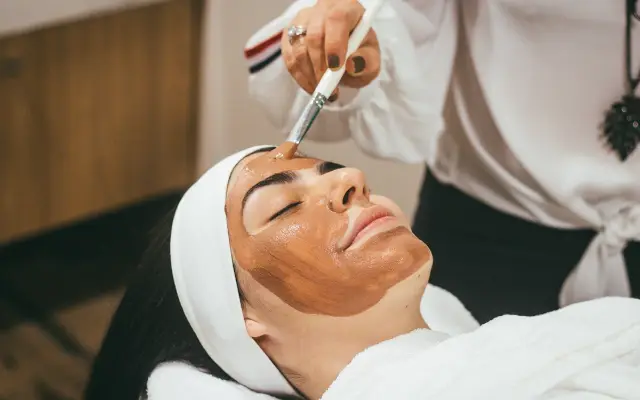 A facial treatment being given at a salon.