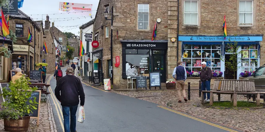 A high street lined with independent local shopfronts.